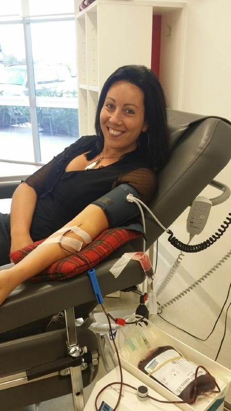 Naomi gives blood